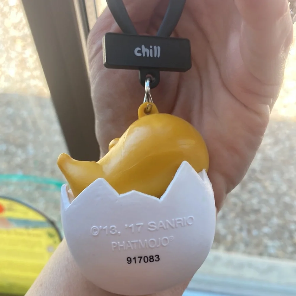 Gudetama keychain in good condition egg man